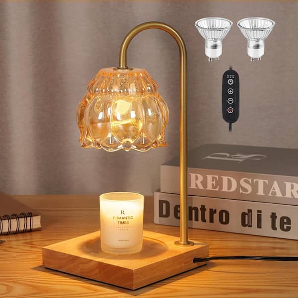 Ivory pillar candles of varying heights arranged on a rustic wooden tray on a Scandinavian fireplace mantel, adding warmth and ambiance.
