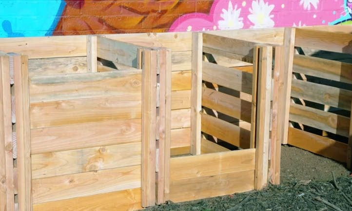 DIY compost bin made from wooden pallets, ready for use