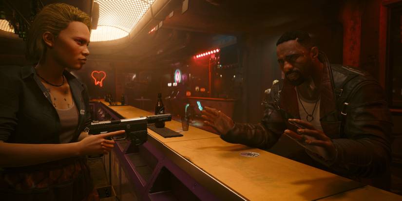 Solomon Reed in a dimly lit, tense conversation.