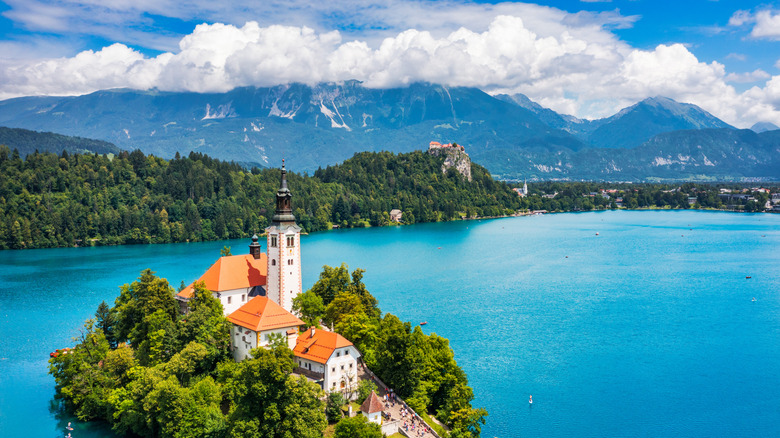 Aerial view of Lake Bled with the island church and Bled Castle in the background