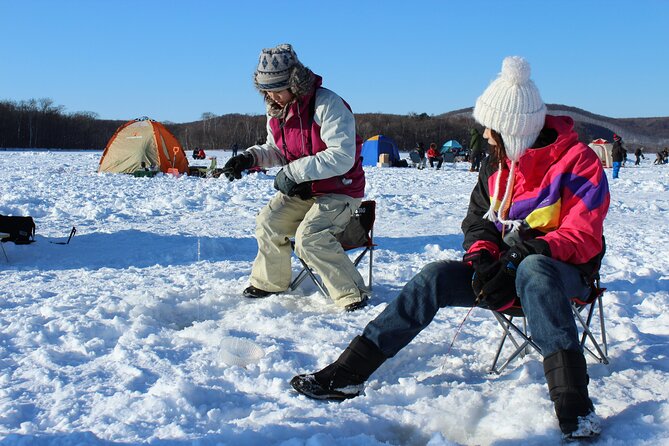 Ice Fishing on Frozen Lake Akan