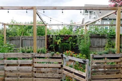 A fence constructed from repurposed pallets.