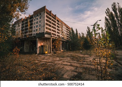A group of Stalkers huddle around a campfire in a dark, desolate area, sharing stories and preparing for their next expedition.
