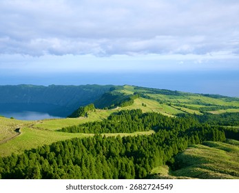 Aerial view of green fields, coast and mountain in Azores Islands Portugal