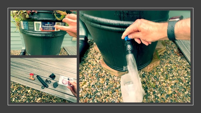 A complete rain barrel system connected to a garden hose