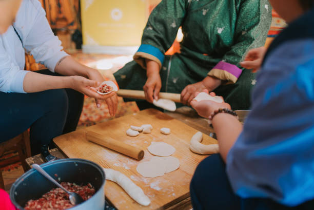 Anya's photography setup inside the yurt, showcasing her Sony Alpha camera and 35mm lens.