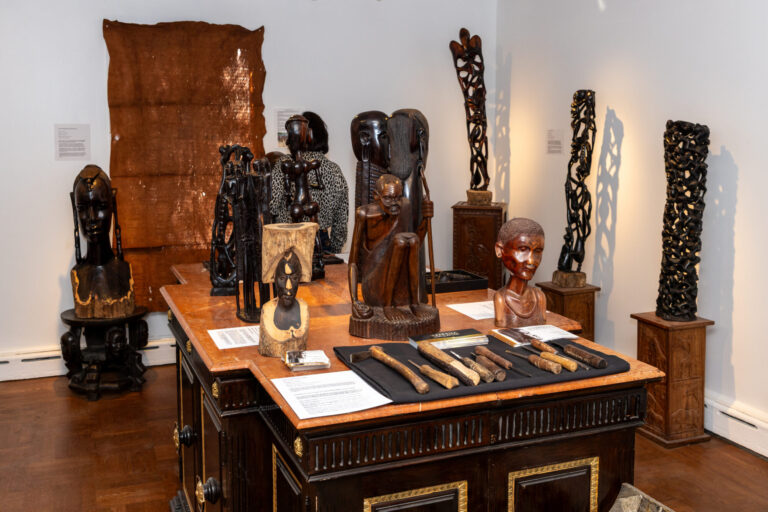 A detailed shot of artwork in The Vault, focusing on the lighting and spatial arrangement.
