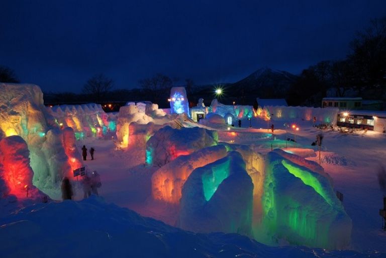 Ice Swimming in Lake Shikotsu with Mount Tarumae in Distance