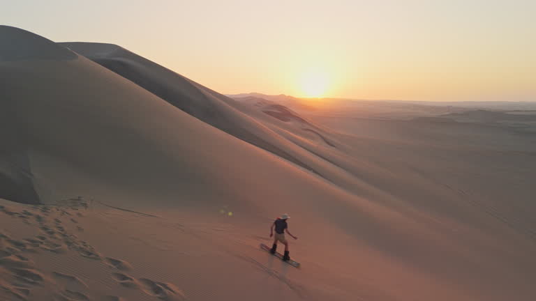 Sandboarding in Namib Desert