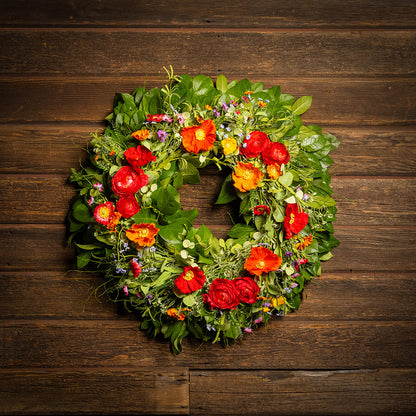 Wreath with greenery and flowers