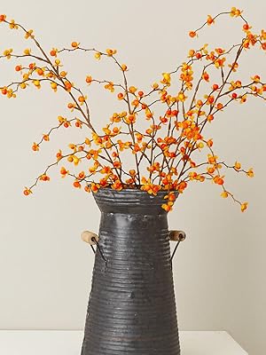 A cluster of ethically sourced pheasant feathers, showcasing their natural patterns and textures, collected responsibly for the autumnal centerpiece