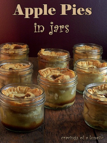 Close-up of apple slices being tossed in spices