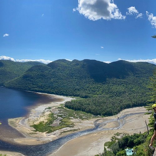 People snow tubing at Mt. Norquay, capturing the thrill of the ride, smiles, and laughter