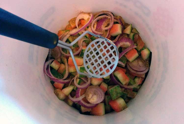 adding food scraps bokashi bucket bran sprinkle