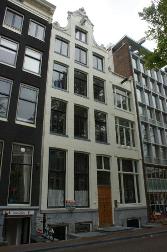 The exterior of The Dylan Amsterdam showcasing the architecture and location on the canal