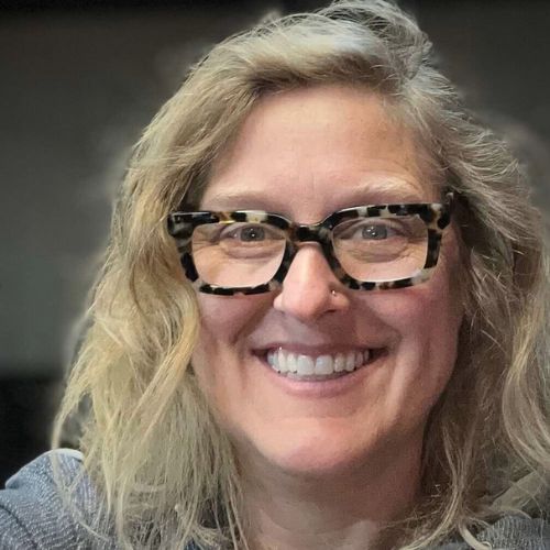 Financial advisor with clients shaking hands