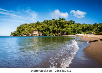 Historical marker with a weathered bronze plaque near Omaha Beach.