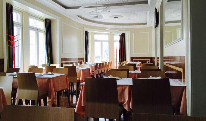 Bica Funicular climbing the steep hill in Bairro Alto