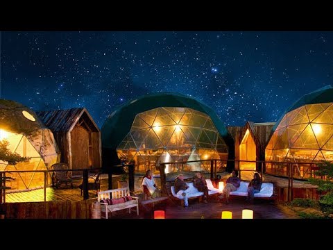 EcoCamp Patagonia geodesic domes with the Torres del Paine peaks in the background