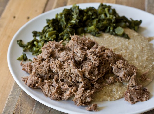 A vast herd of elephants gathered at the Chobe River, silhouetted against the setting sun, captured with a long lens to responsibly document their natural behavior.