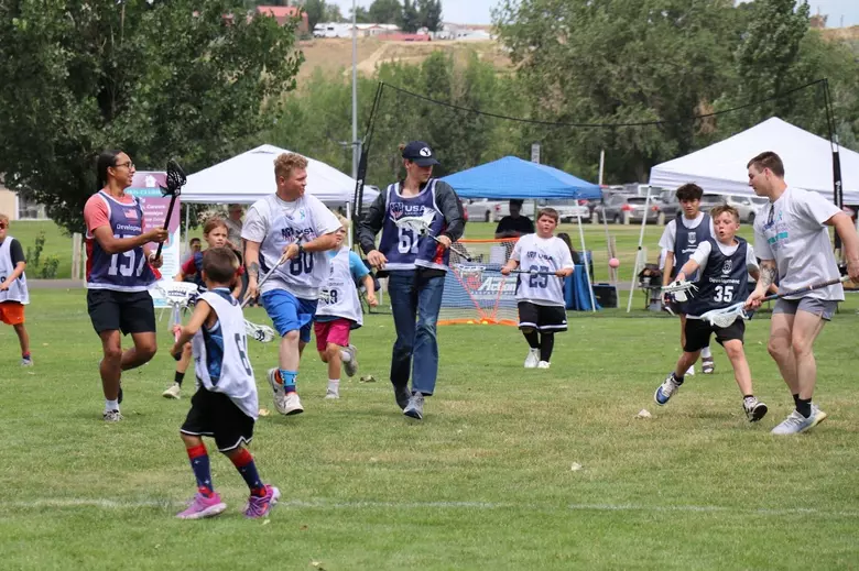Climber's Hands Gripping an Ice Axe