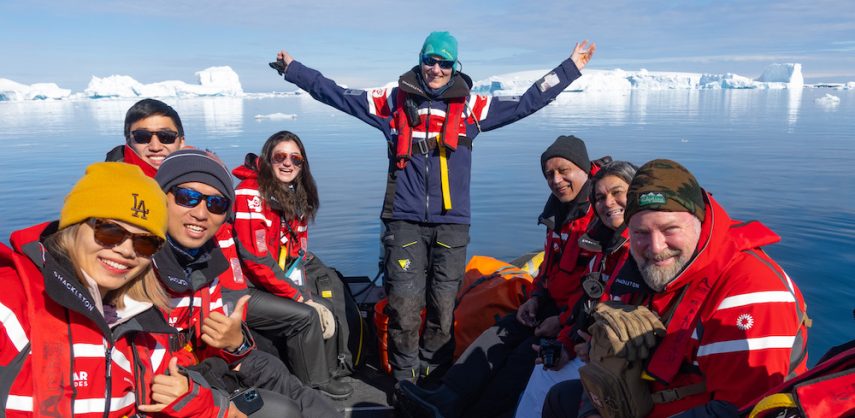 Freediver swimming with a manta ray