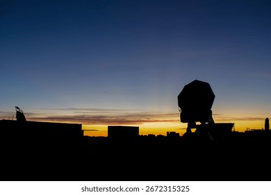 Interior of the train car Airbnb, showcasing the amber-tinted lighting and blackout curtains