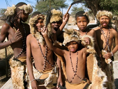 A close-up shot of an African Fish Eagle perched on a branch overlooking a waterway in the Okavango Delta.