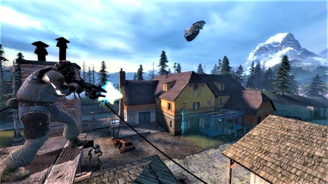A player in the Citadel Core is using debris and strategic placement with the Gravity Gun to defeat a Stalker. The sterile, metallic architecture of the Citadel is visible.