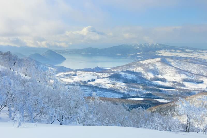 Snowmobiler traversing the snow-covered Shiretoko Peninsula