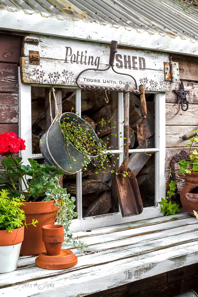 Busy local flea market overflowing with farm tools