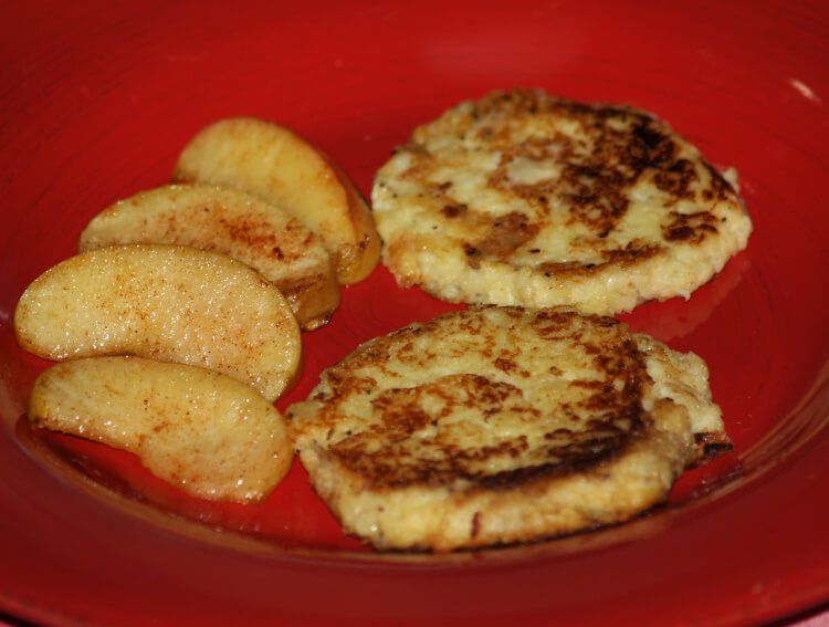 Group family making apple fritters
