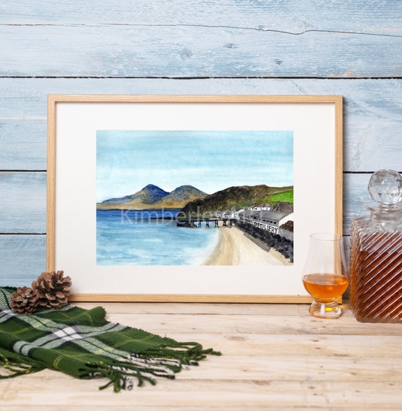 Kayaking on Loch Coruisk with the Cuillin mountains reflected in the calm water
