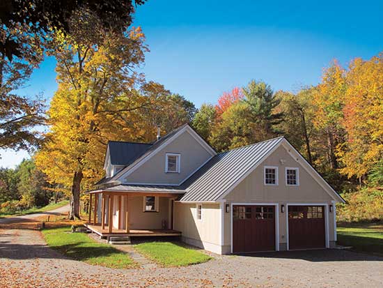 A house surrounded by lush greenery and a vibrant garden, exemplifying a resilient home in a thriving environment.