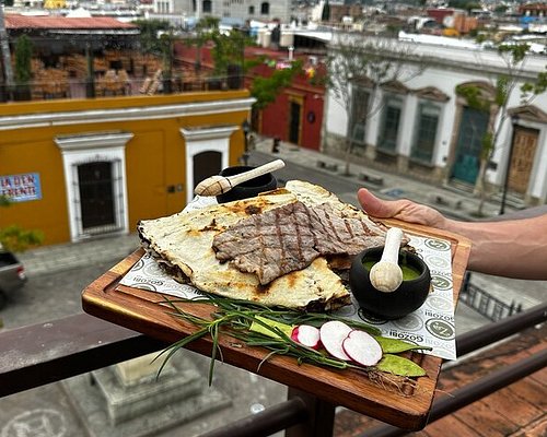 A close-up of Oaxacan dishes, showcasing the vibrant colors and ingredients