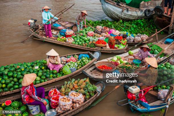 Floating market with colorful fruits and spices on the Mekong River