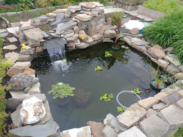 pond liner being properly installed