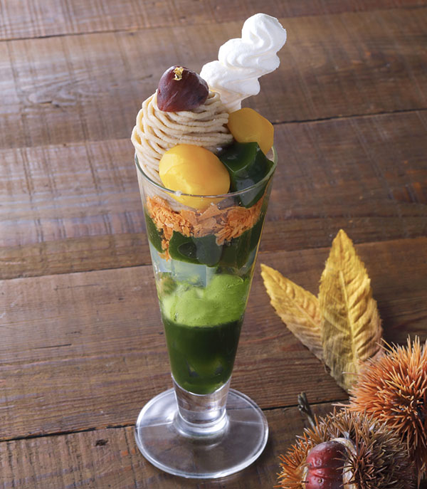 A close-up shot of Takoyaki being prepared at Nishiki Market, highlighting the sizzling grill and the eager faces of the customers