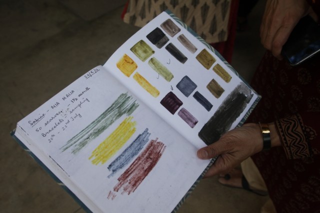hand stirring fabric dye pot garden